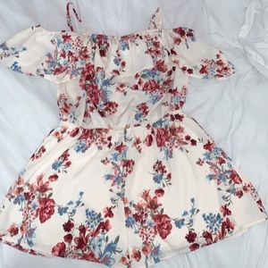 An off the shoulder romper